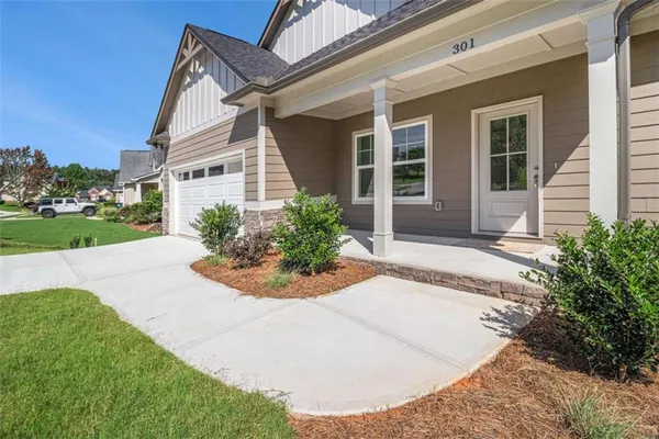 front view of a house with a yard