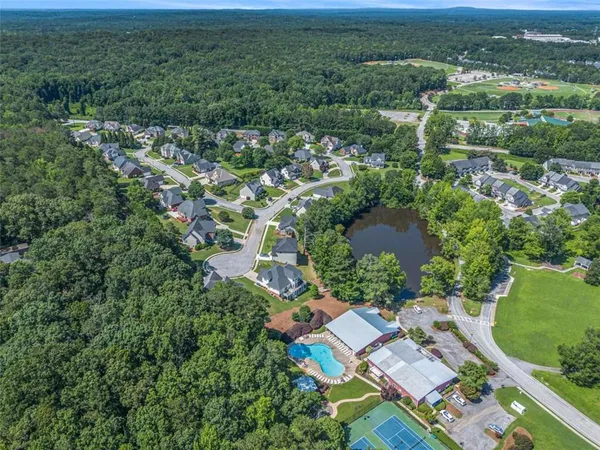 an aerial view of residential house with outdoor space