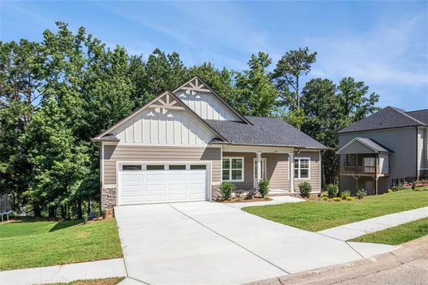 a front view of a house with yard