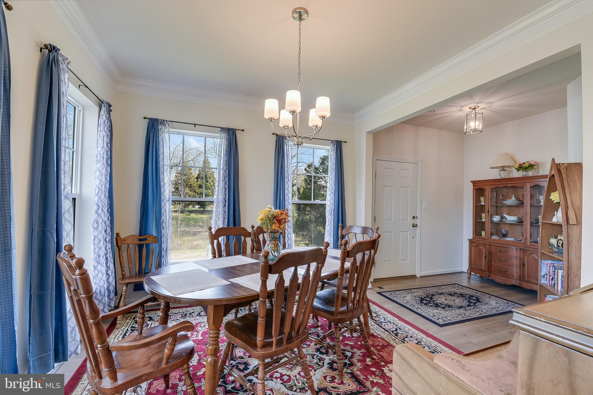 23680 West Patuxent Beach Road California, MD 20619 - Photo 6 of 38 a view of a dining room with furniture and window