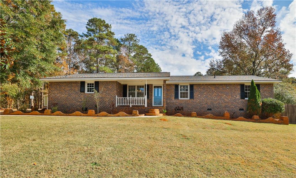 40 Salem Branch Road Covington, GA 30016 - Photo 1 of 1 front view of a house with a yard