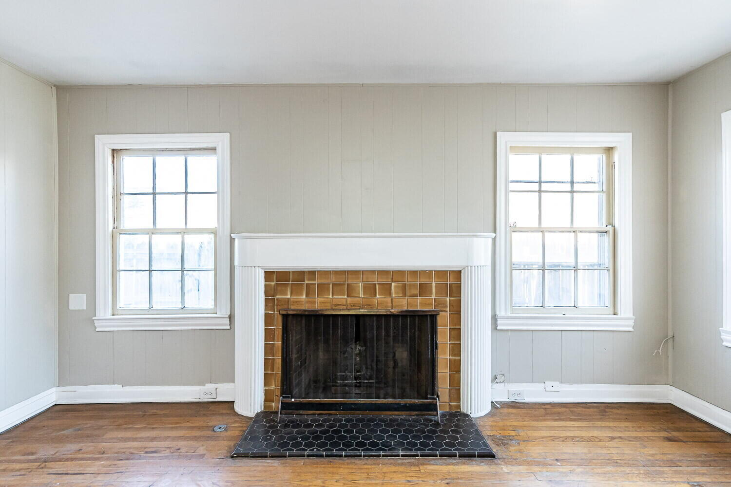 1914 25th Street Lubbock, TX 79411 - Photo 36 of 48 an empty room with fireplace and windows