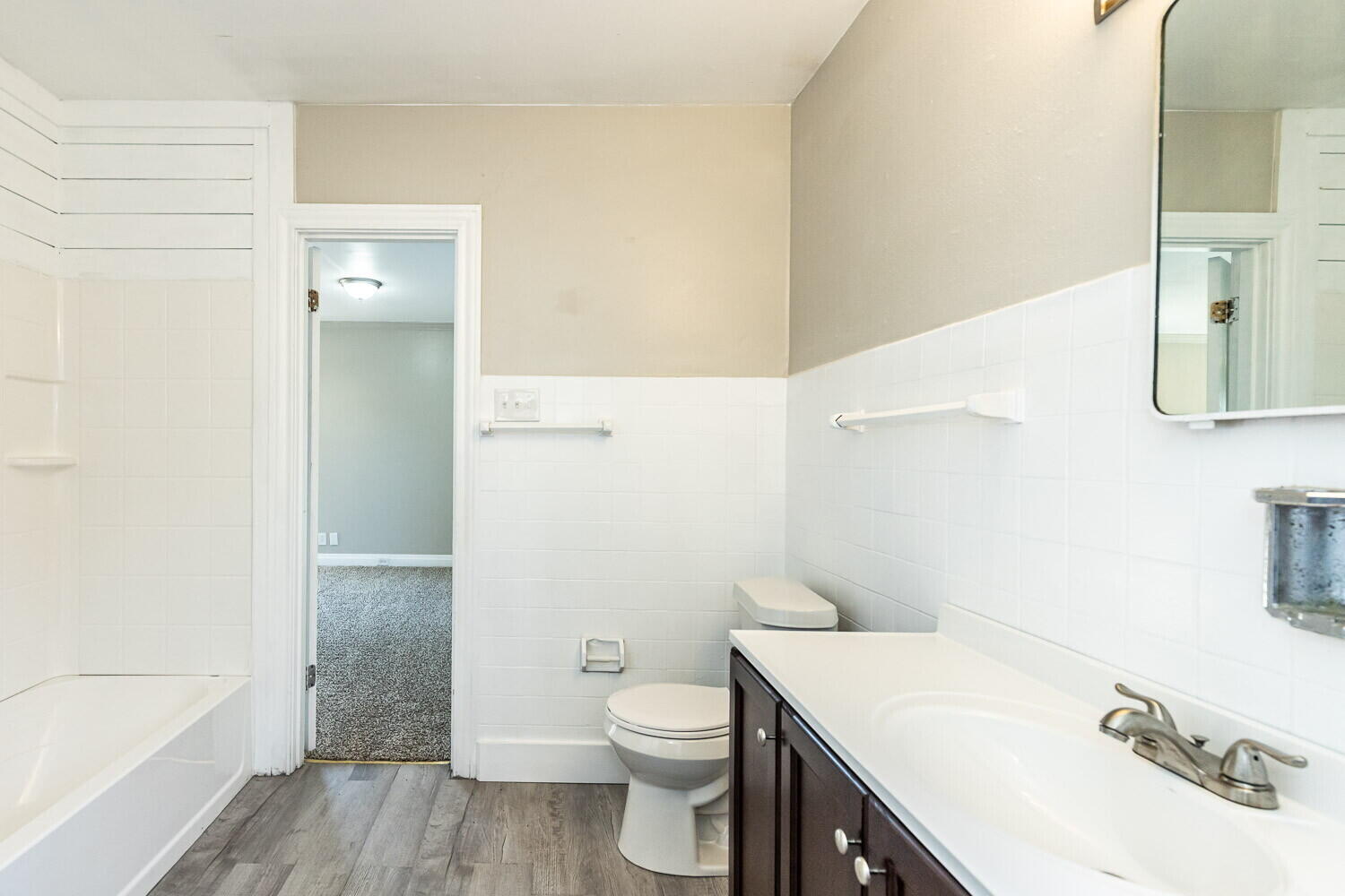 1914 25th Street Lubbock, TX 79411 - Photo 39 of 48 a bathroom with a sink a toilet and shower