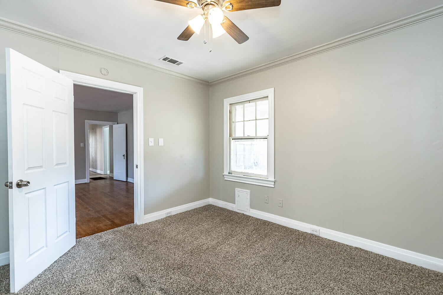 1914 25th Street Lubbock, TX 79411 - Photo 47 of 48 a view of a livingroom with a ceiling fan and window
