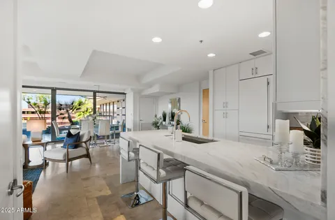 a view of living room with furniture and a window