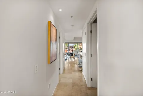 a bathroom with a double vanity sink mirror and toilet