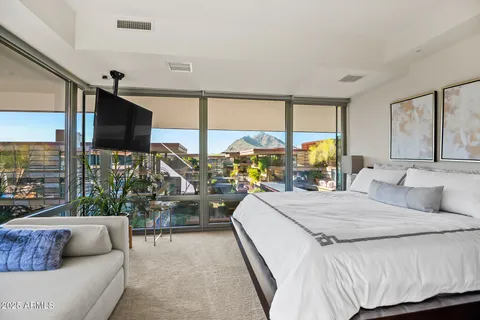 a bathroom with a shower and a sink