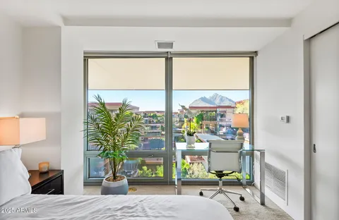 a view of house with large windows