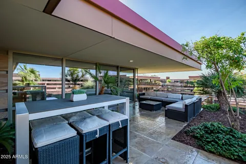 a outdoor living space with furniture and garden view