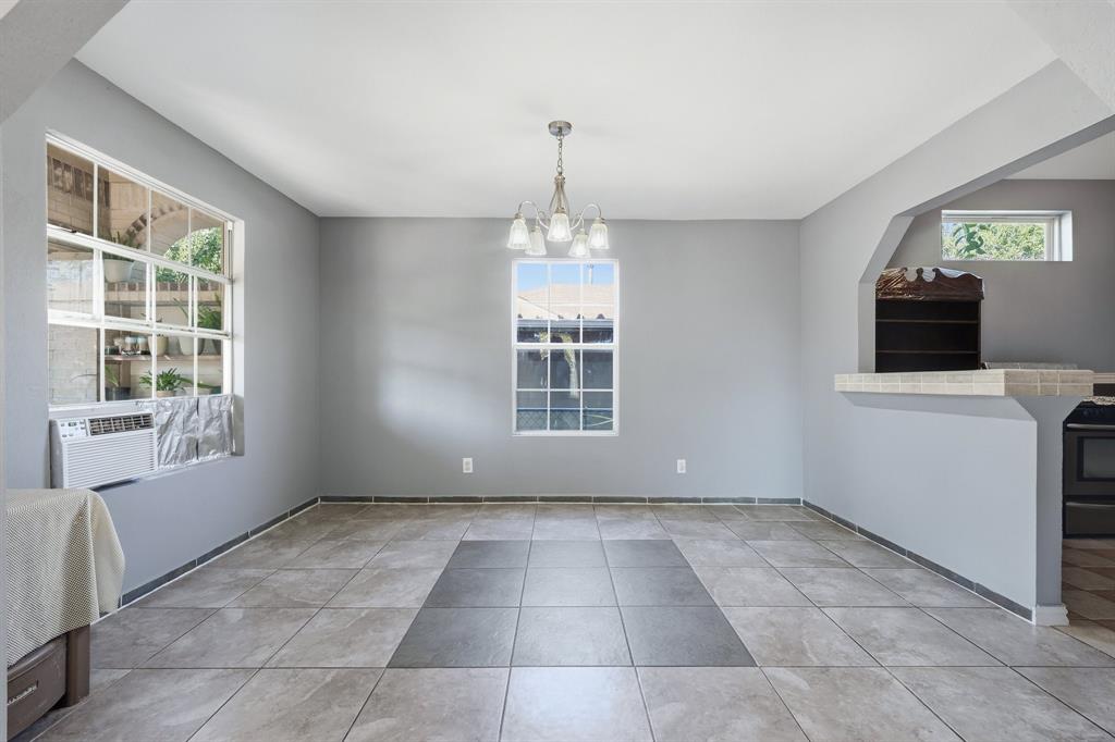 3604 Waters Street Lancaster, TX 75134 - Photo 5 of 15 a view of an empty room with a window