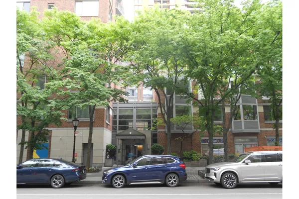 a car parked in front of a house