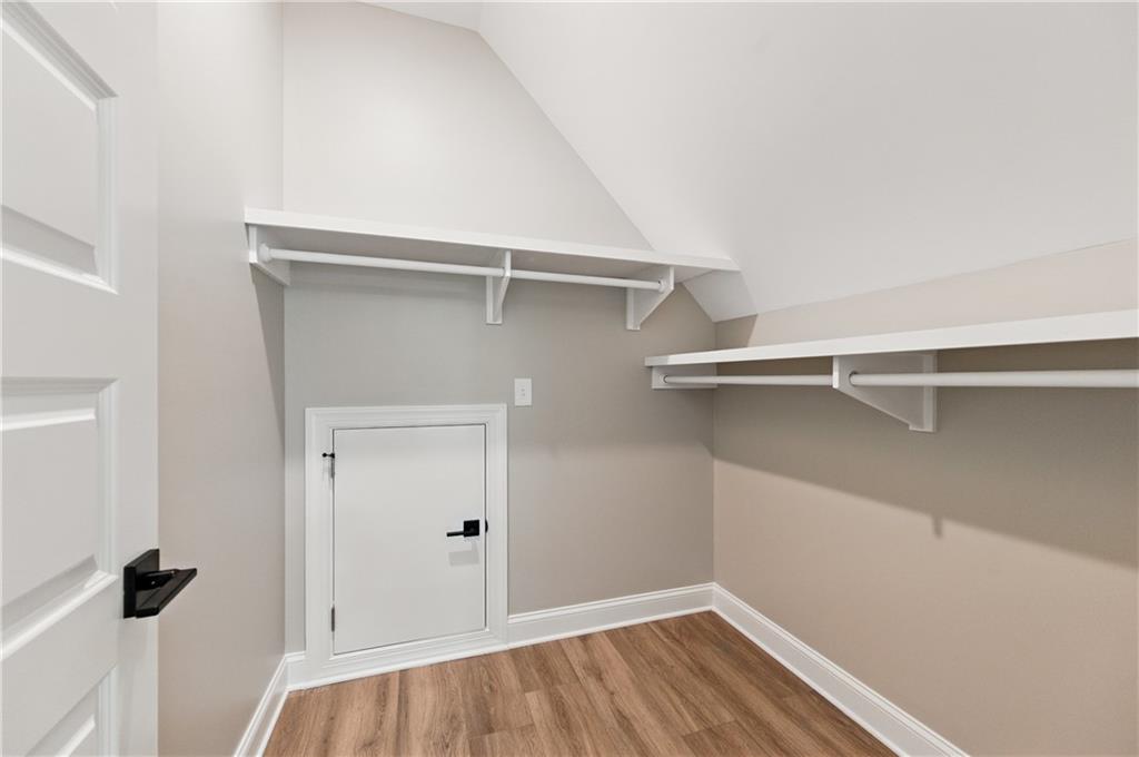 5119 Yellow Creek Road Ball Ground, GA 30107 - Photo 34 of 48 a view of an empty walk in closet