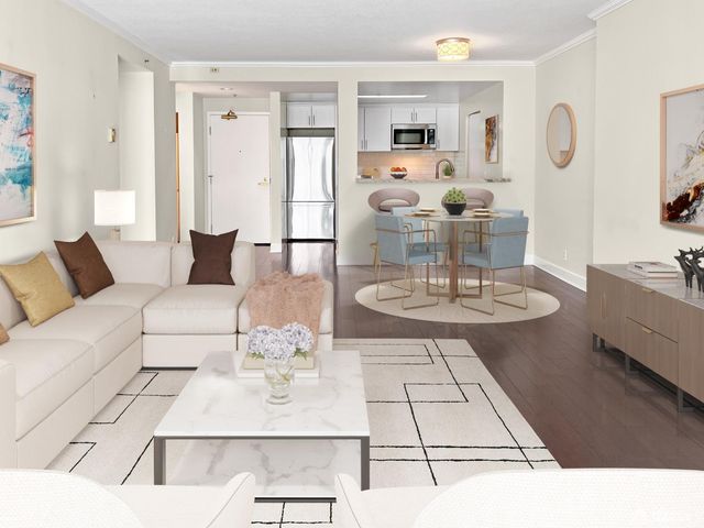 a living room with furniture and a table