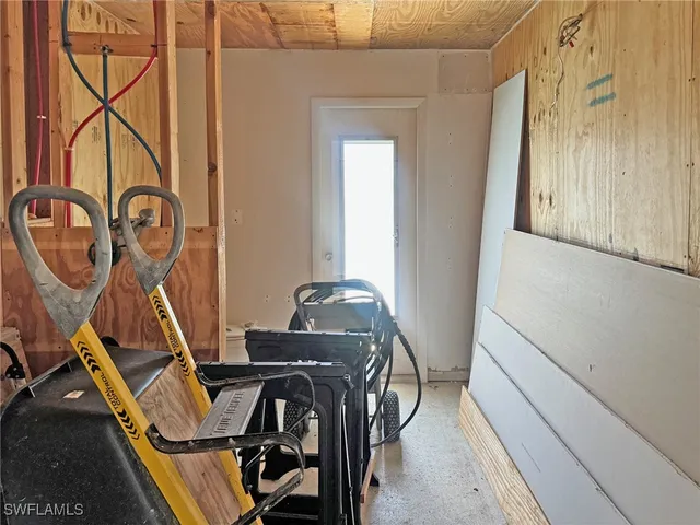a view of balcony with furniture