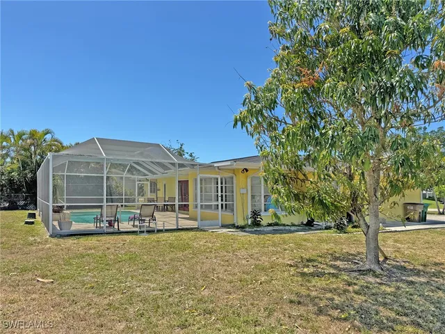 a view of a house with a big yard