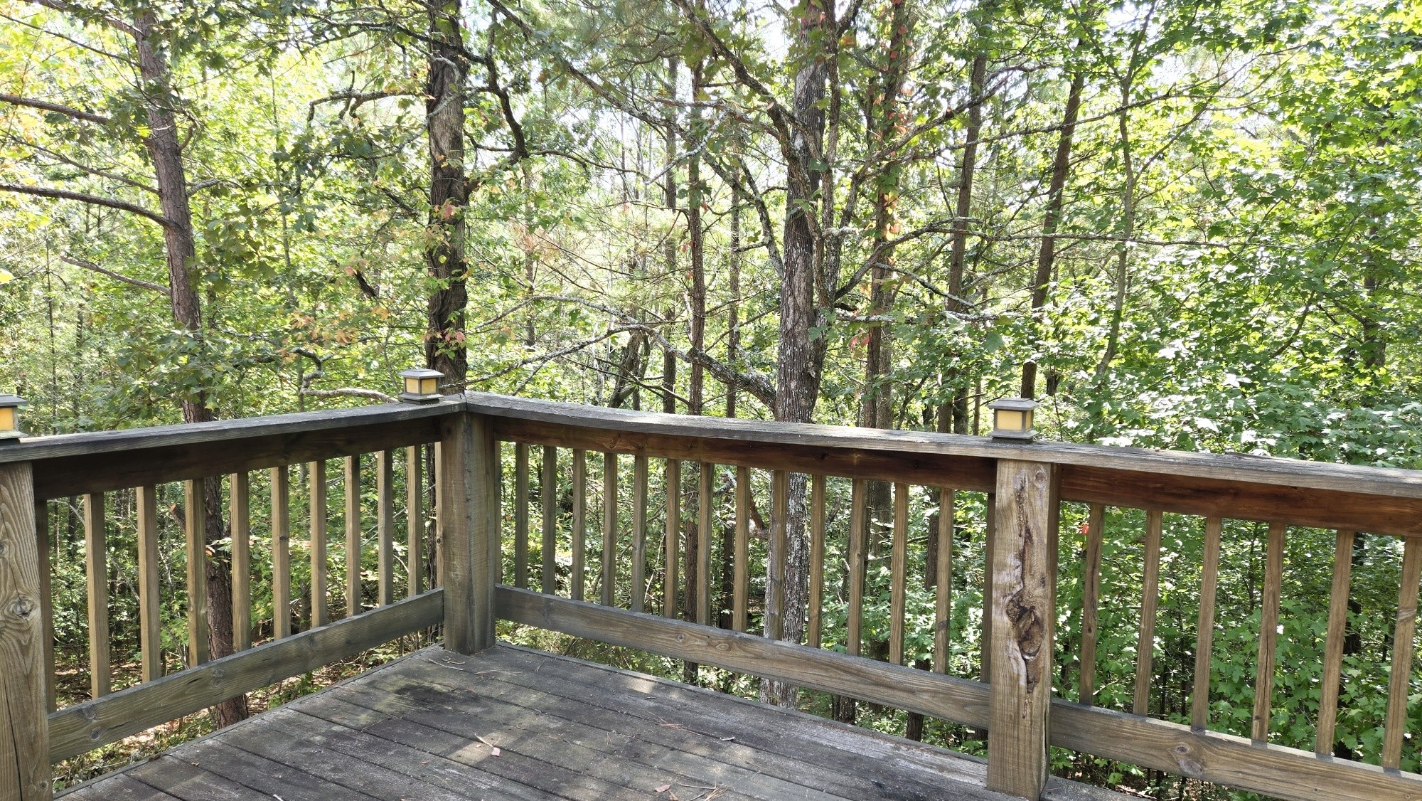 95 Ratteree Road Buchanan, TN 38222 - Photo 28 of 33 a view of a wooden deck next to a yard
