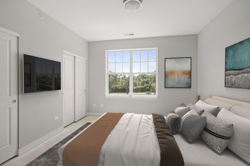 401 Haber Road, Unit 102 Cary, IL 60013 - Photo 5 of 6 a bedroom with a bed and window