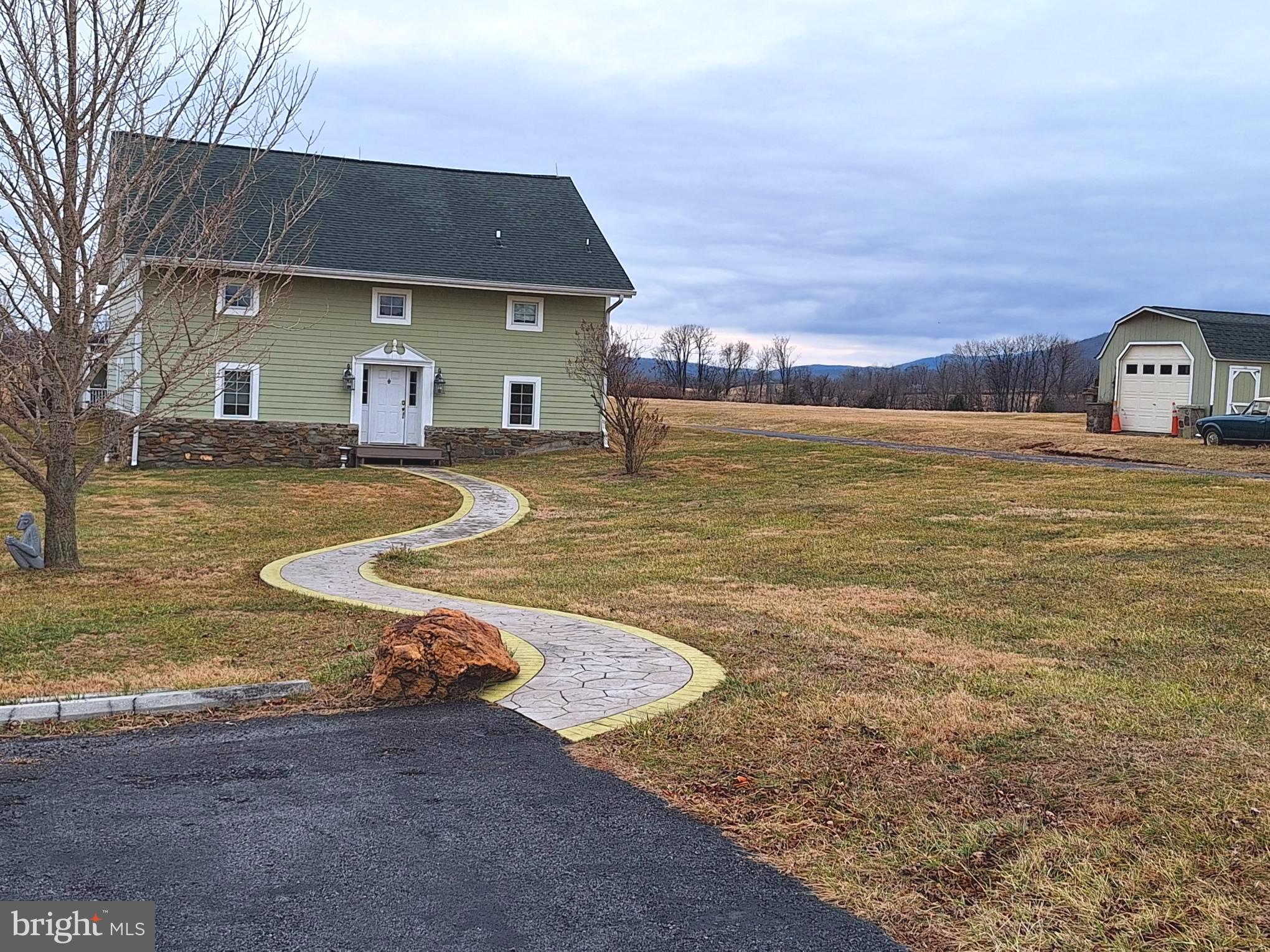 a view of a house with swimming pool