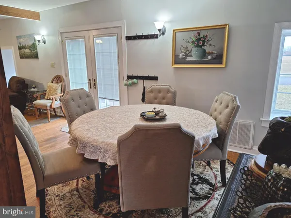 a view of a dining room with furniture