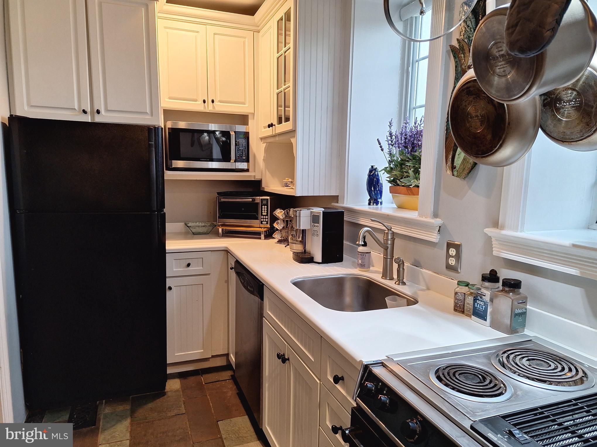 2254 Winchester Road Delaplane, VA 20144 - Photo 15 of 50 a kitchen with a stove and a sink