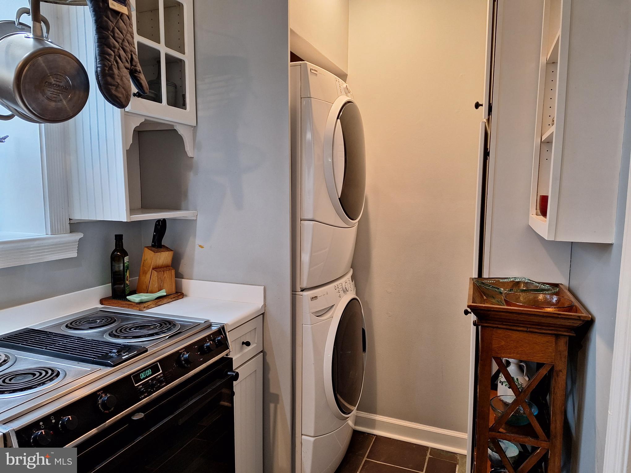 2254 Winchester Road Delaplane, VA 20144 - Photo 16 of 50 a kitchen with stainless steel appliances a stove a washer and dryer