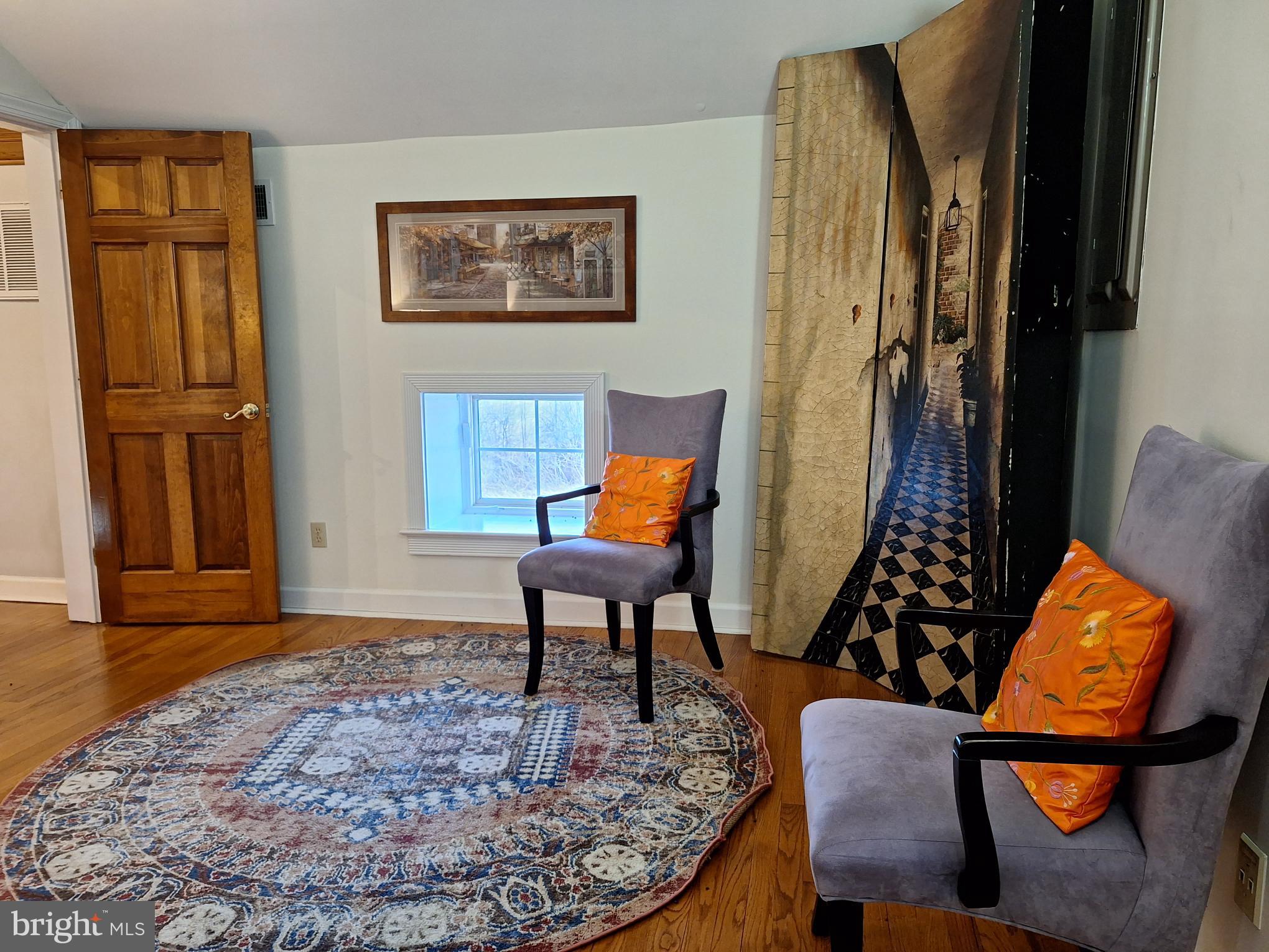 2254 Winchester Road Delaplane, VA 20144 - Photo 30 of 50 a workspace room with furniture and wooden floor