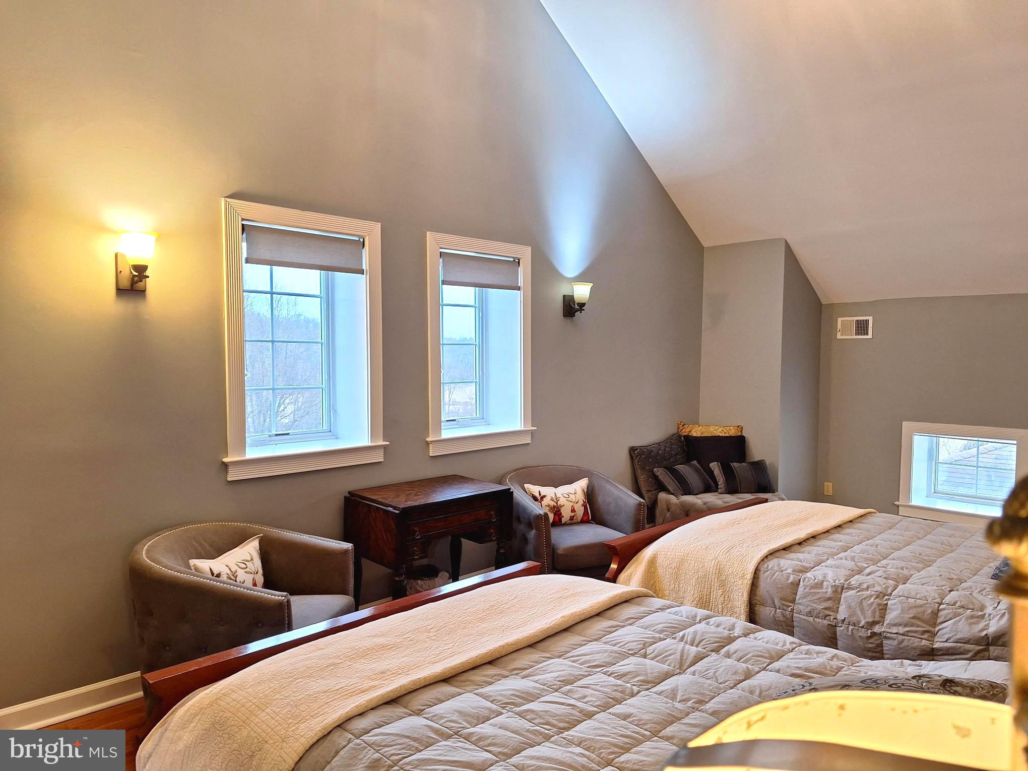 2254 Winchester Road Delaplane, VA 20144 - Photo 36 of 50 a bedroom with two beds and painted walls