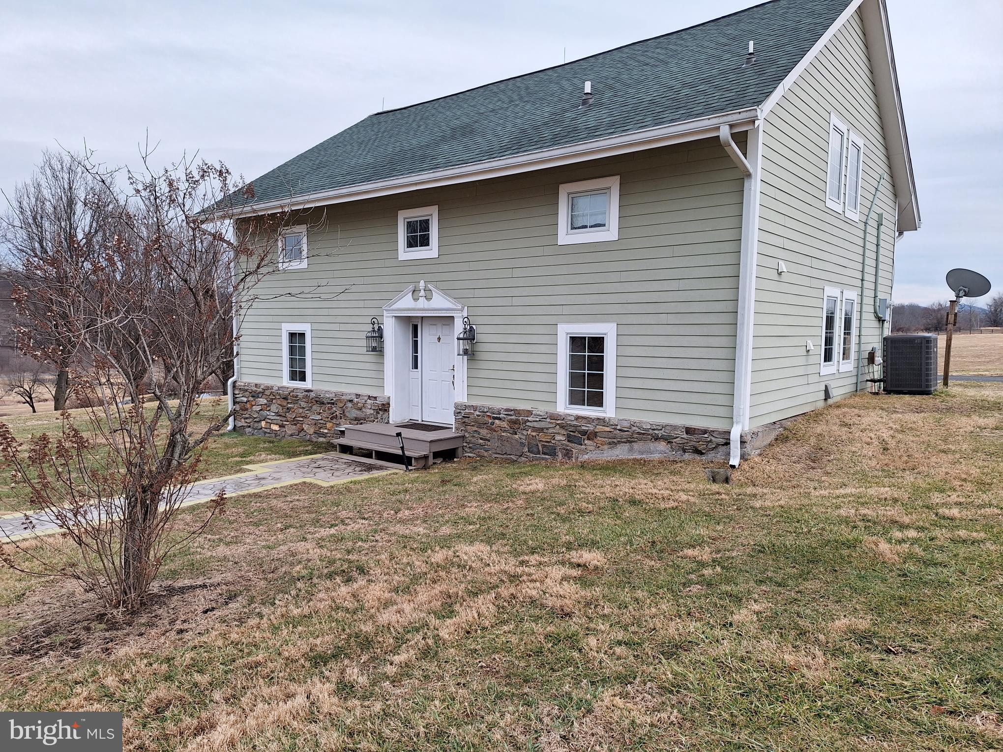 2254 Winchester Road Delaplane, VA 20144 - Photo 45 of 50 a view of a house with a yard