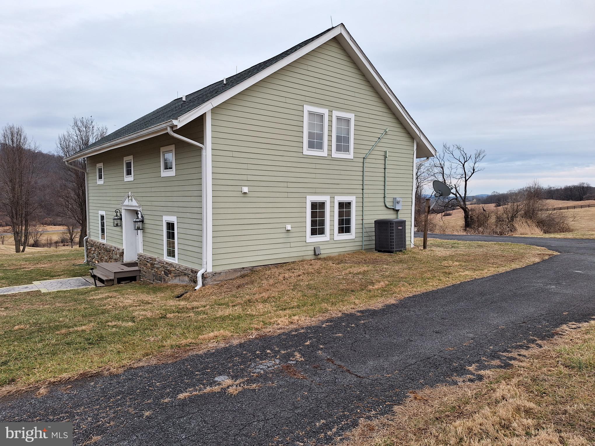 2254 Winchester Road Delaplane, VA 20144 - Photo 46 of 50 a view of a house with a yard