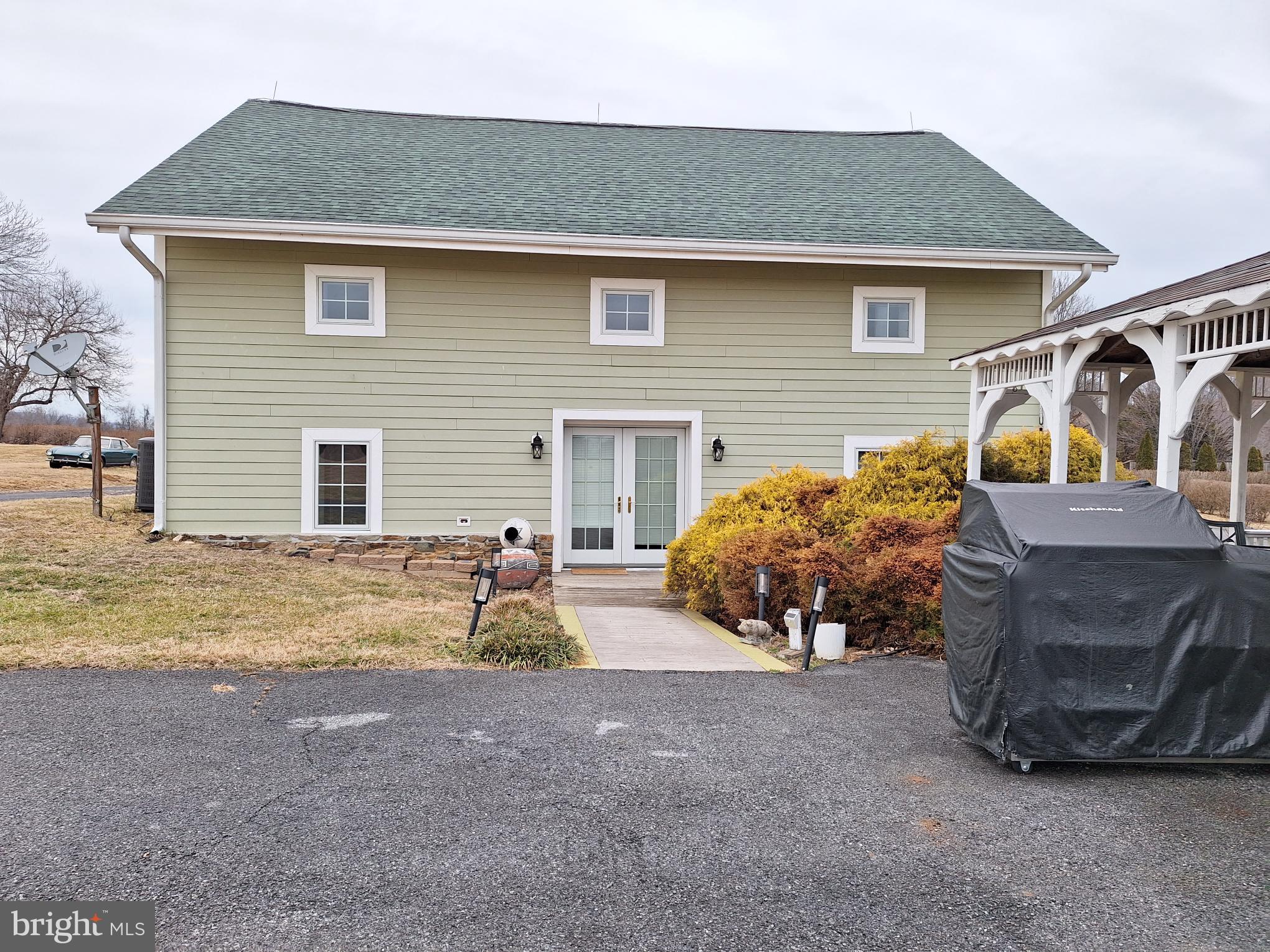 2254 Winchester Road Delaplane, VA 20144 - Photo 47 of 50 a view of a house with a patio