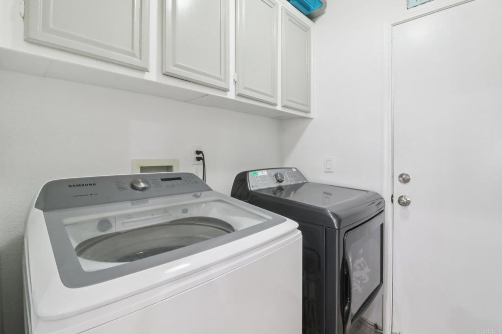 232 Manzanilla Way Oceanside, CA 92057 - Photo 19 of 35 a utility room with dryer and washer