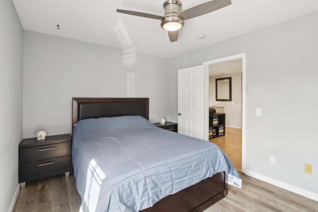 232 Manzanilla Way Oceanside, CA 92057 - Photo 29 of 35 a bedroom with a bed and a closet