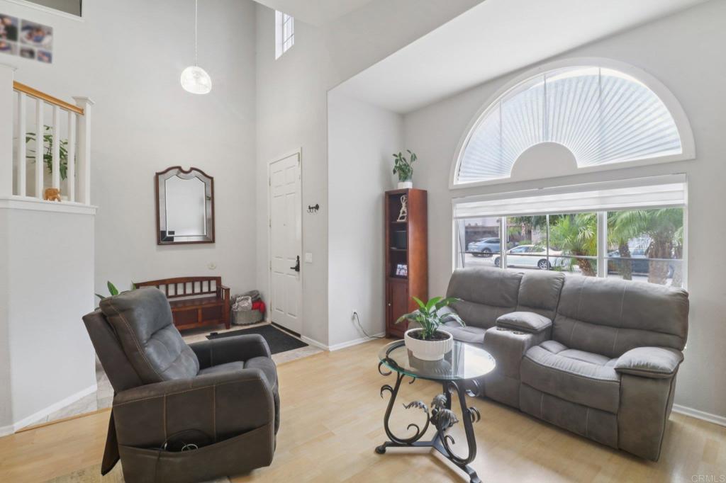 232 Manzanilla Way Oceanside, CA 92057 - Photo 4 of 35 a living room with furniture and a large window
