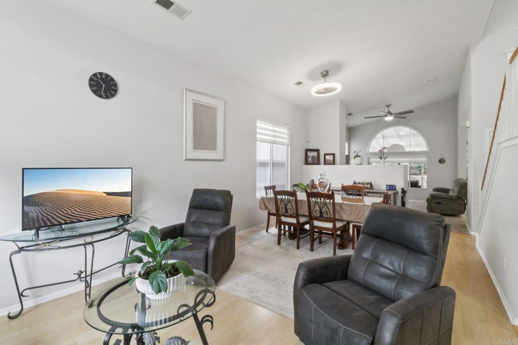 232 Manzanilla Way Oceanside, CA 92057 - Photo 5 of 35 a living room with furniture and a flat screen tv