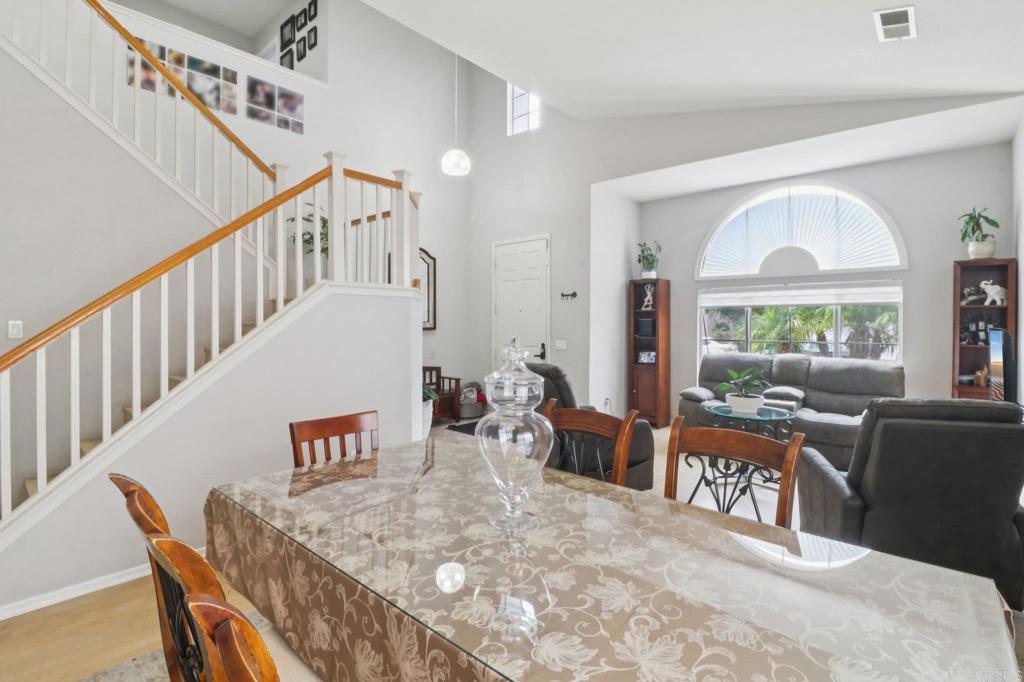 232 Manzanilla Way Oceanside, CA 92057 - Photo 7 of 35 a living room with furniture and a large window