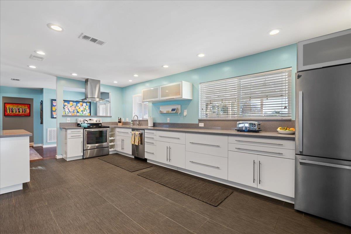 7261 Dry Creek Road Rio Linda, CA 95673 - Photo 12 of 59 a kitchen with cabinets and window