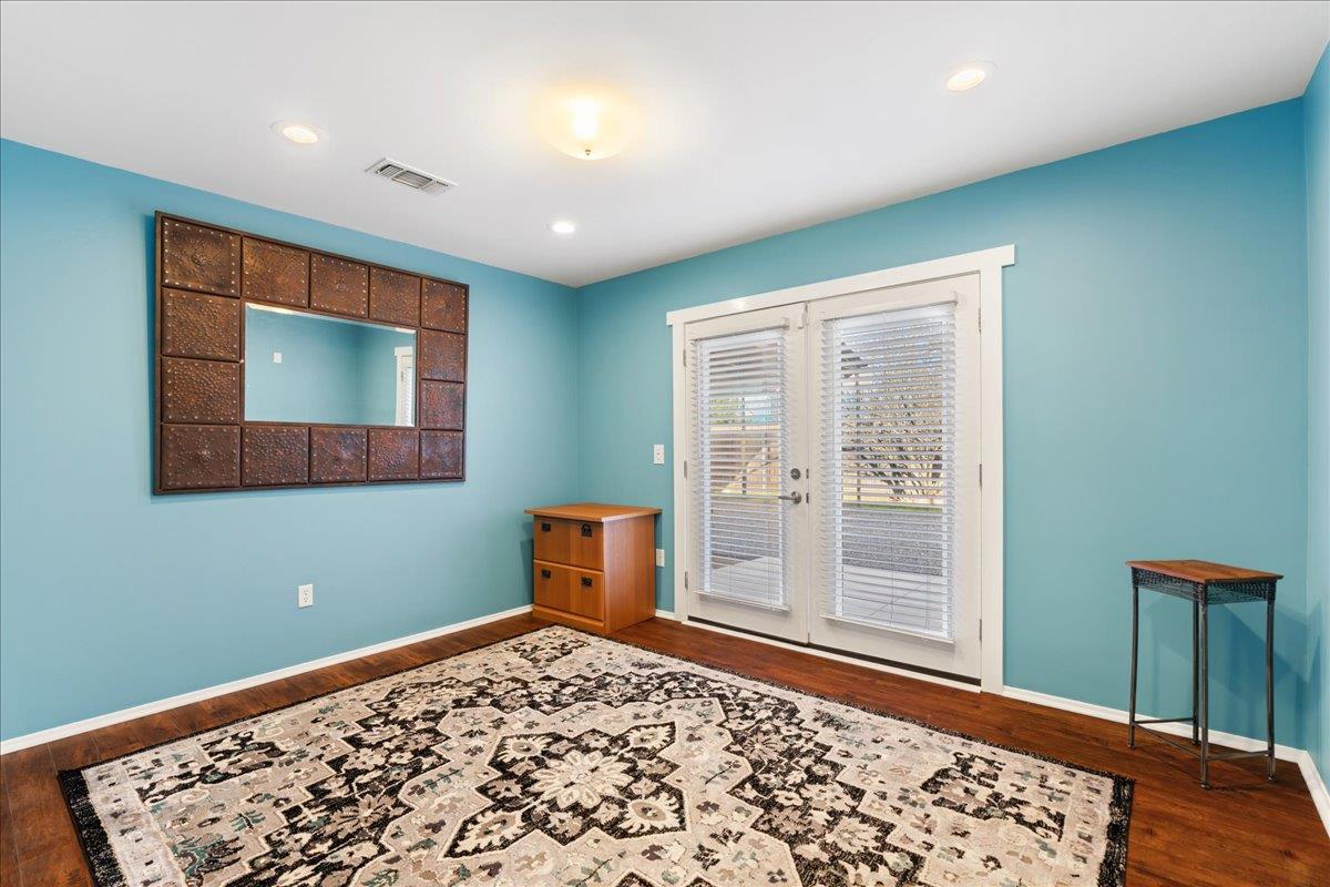 7261 Dry Creek Road Rio Linda, CA 95673 - Photo 15 of 60 a bedroom with furniture and a window