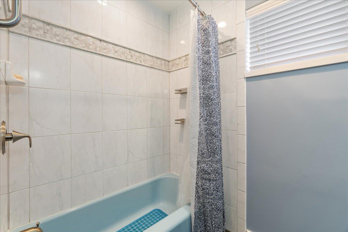 7261 Dry Creek Road Rio Linda, CA 95673 - Photo 18 of 60 a bathroom with a shower