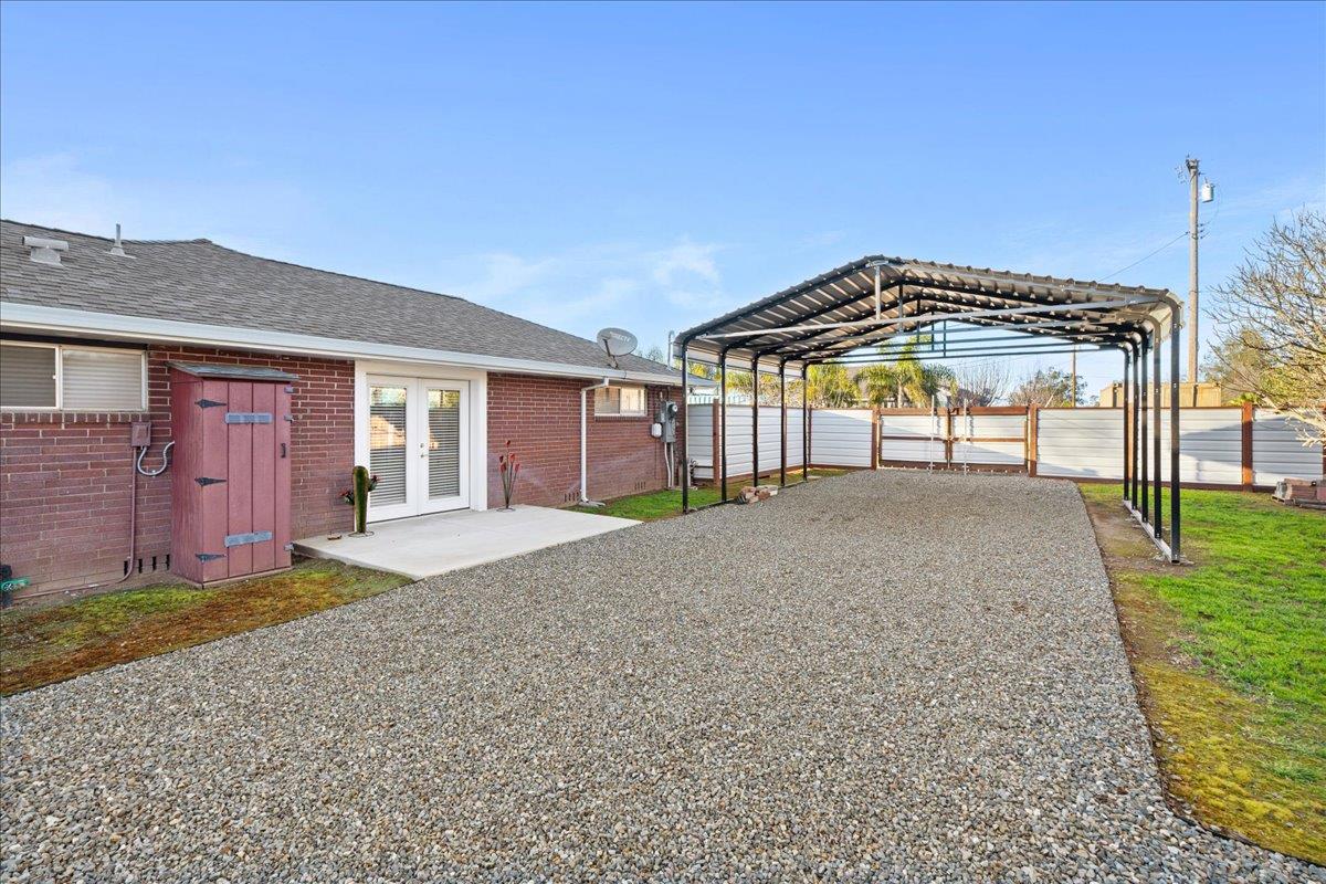 7261 Dry Creek Road Rio Linda, CA 95673 - Photo 26 of 60 a front view of a house with a garden