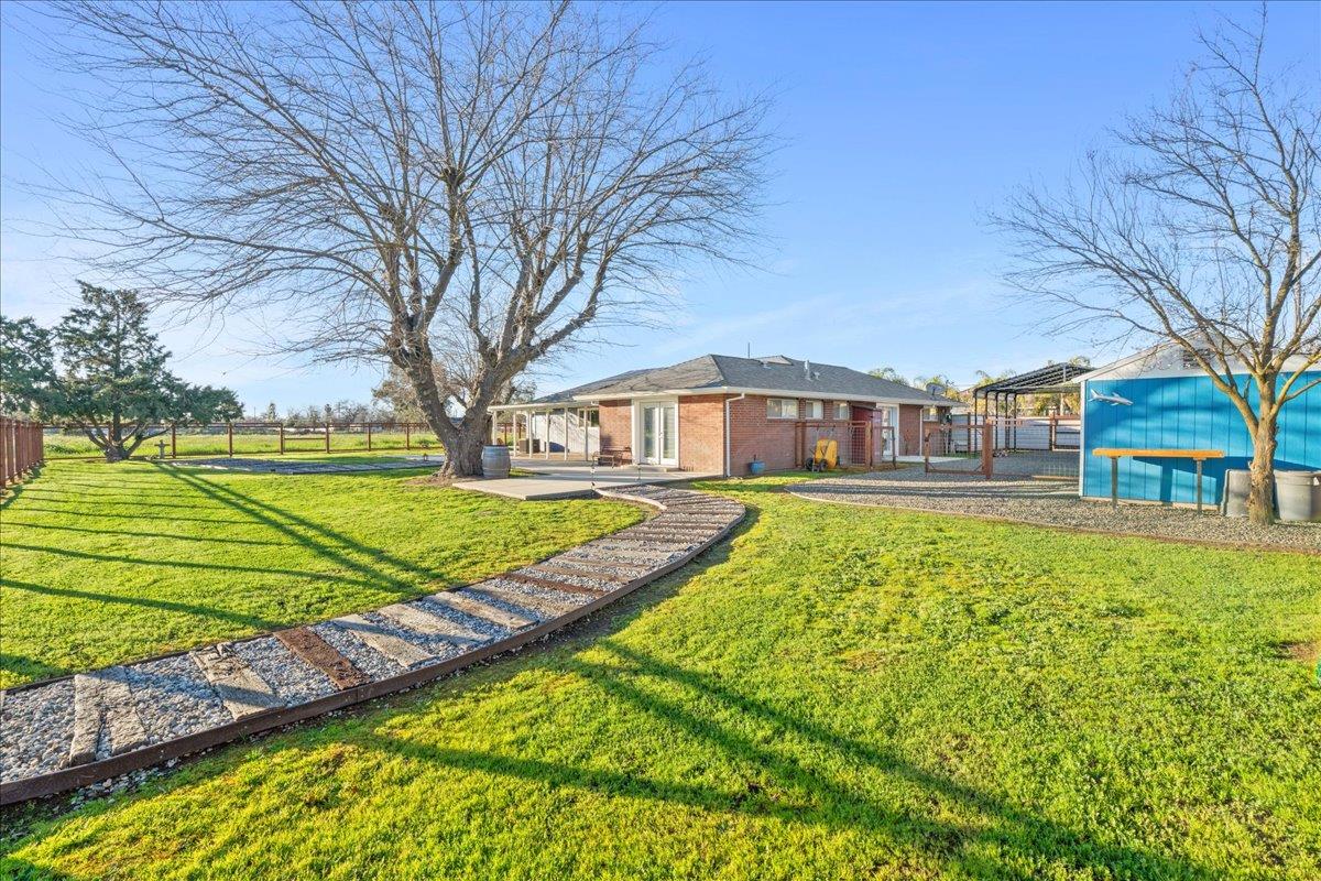 7261 Dry Creek Road Rio Linda, CA 95673 - Photo 28 of 60 a view of a house with a big yard