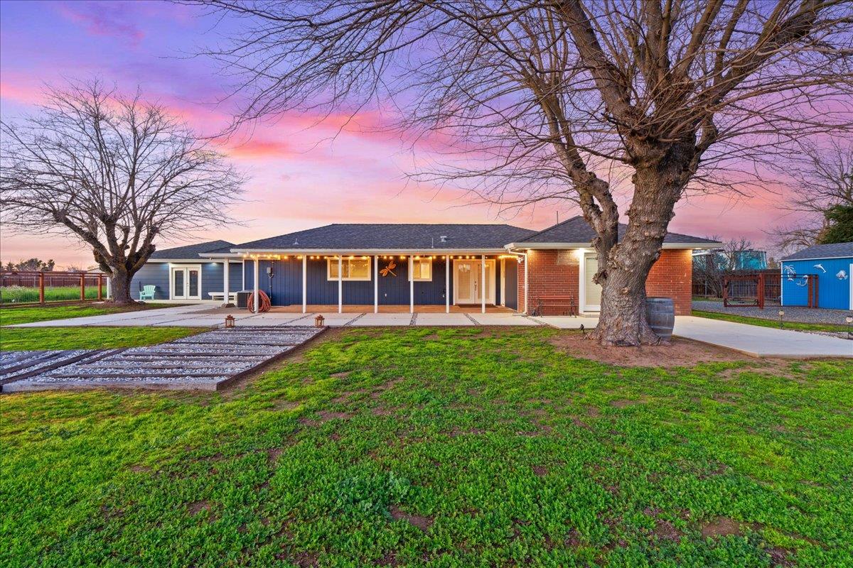 7261 Dry Creek Road Rio Linda, CA 95673 - Photo 30 of 60 a view of a house with a yard