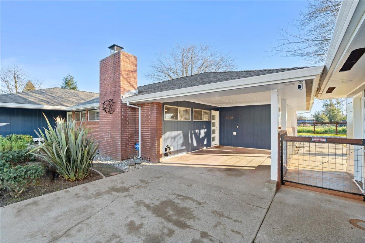 7261 Dry Creek Road Rio Linda, CA 95673 - Photo 34 of 60 a view of a house with backyard and porch