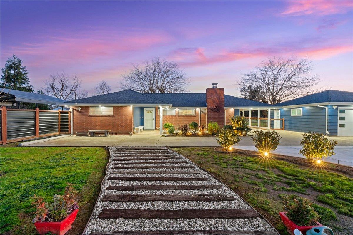 7261 Dry Creek Road Rio Linda, CA 95673 - Photo 41 of 60 a front view of a house with garden