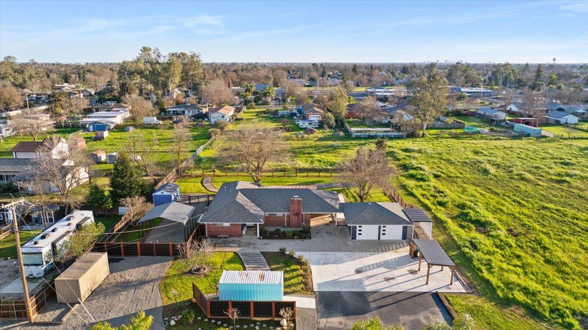 7261 Dry Creek Road Rio Linda, CA 95673 - Photo 46 of 60 an aerial view of residential houses with outdoor space and swimming pool