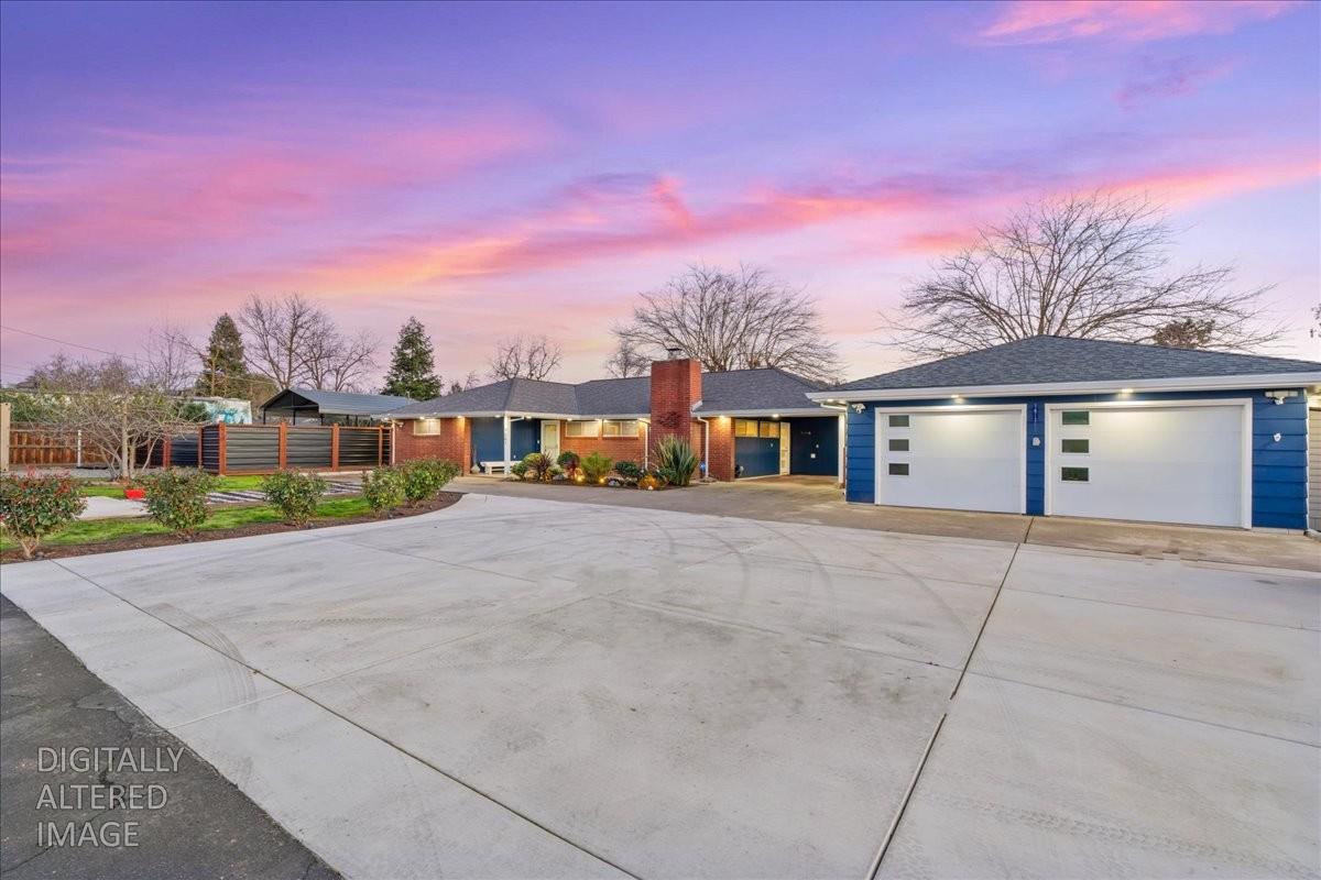 7261 Dry Creek Road Rio Linda, CA 95673 - Photo 5 of 59 front view of a house with a street