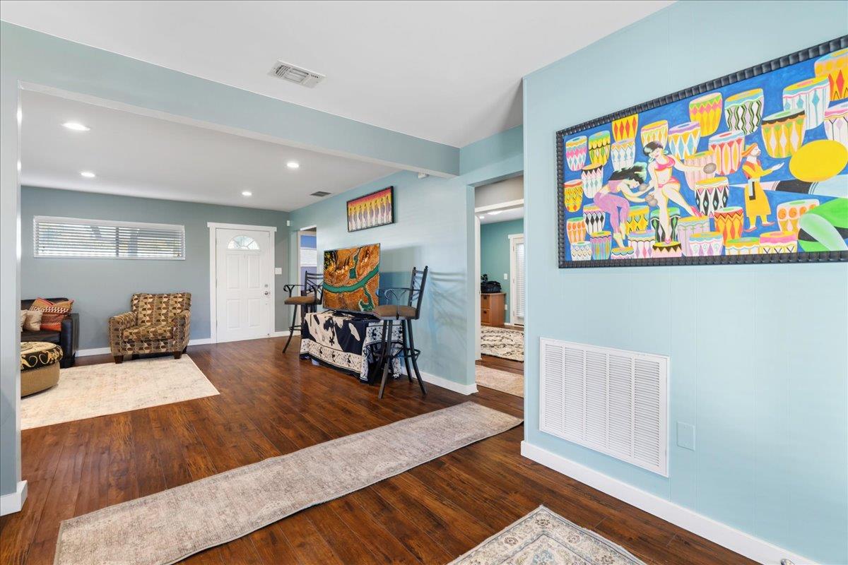 7261 Dry Creek Road Rio Linda, CA 95673 - Photo 8 of 60 a living room with furniture and wooden floor