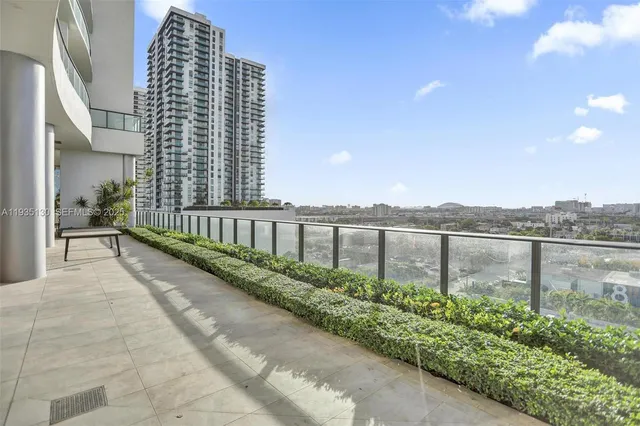 a view of a building with a patio