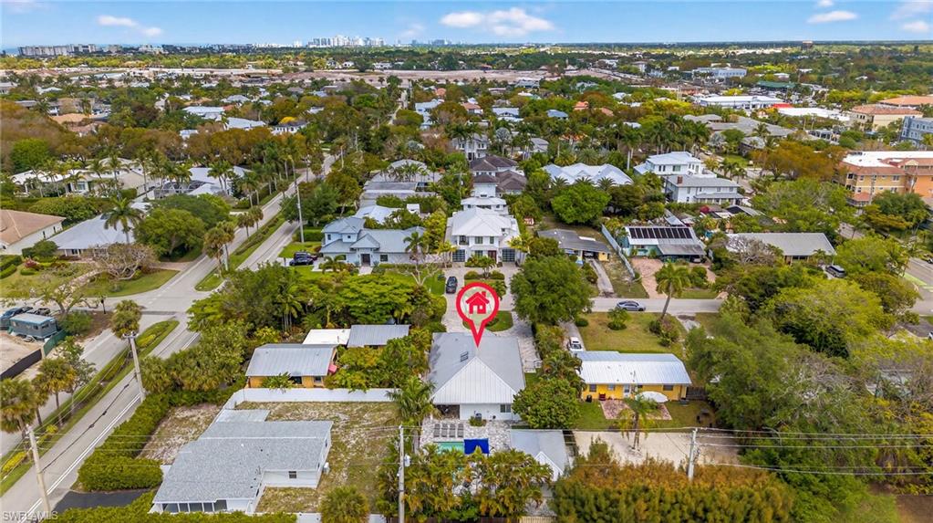 740 5th Avenue North Naples, FL 34102 - Photo 43 of 43 an aerial view of residential houses with outdoor space and swimming pool