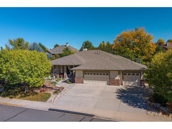 a house with trees in the background