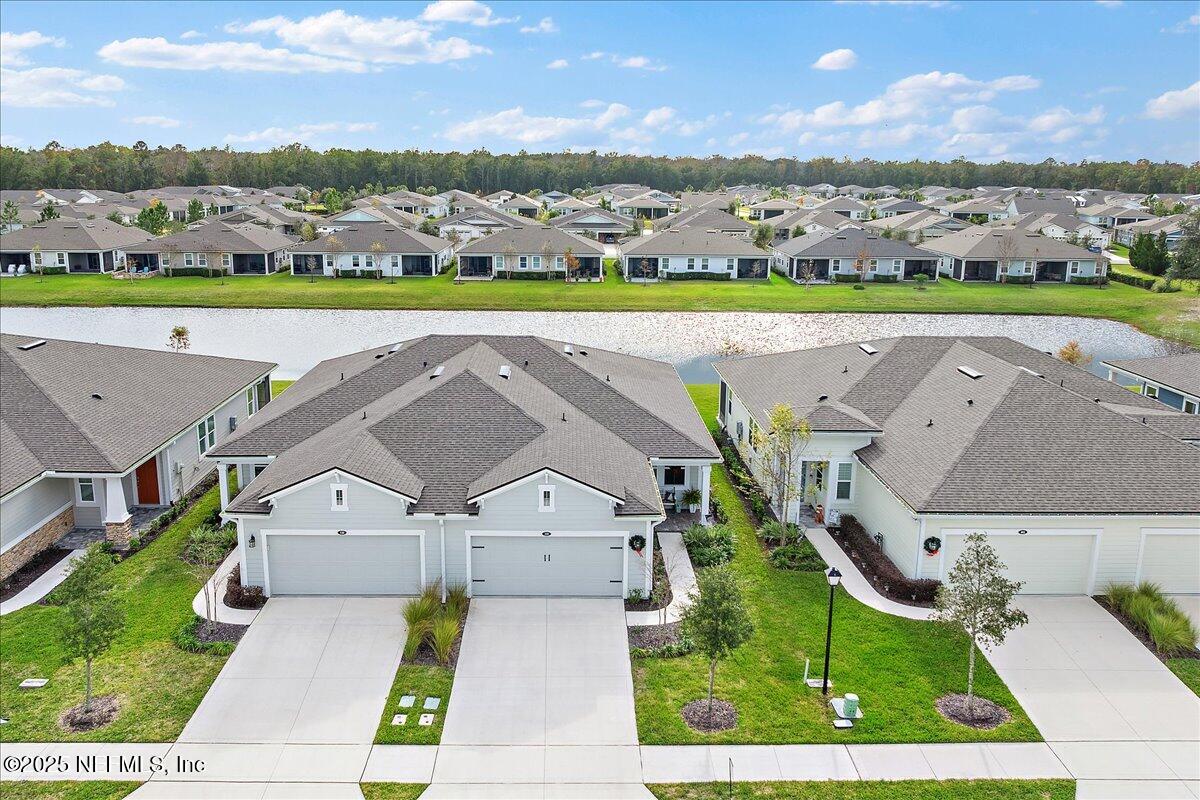 110 Fly Line Drive St. Johns, FL 32259 - Photo 3 of 65 an aerial view of a house with a yard basket ball court and outdoor seating